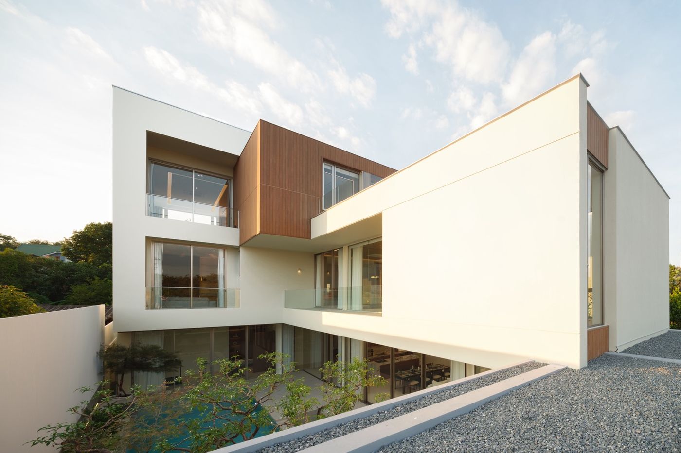 Pool villa property management Chiang Mai — resort with pools and greenery